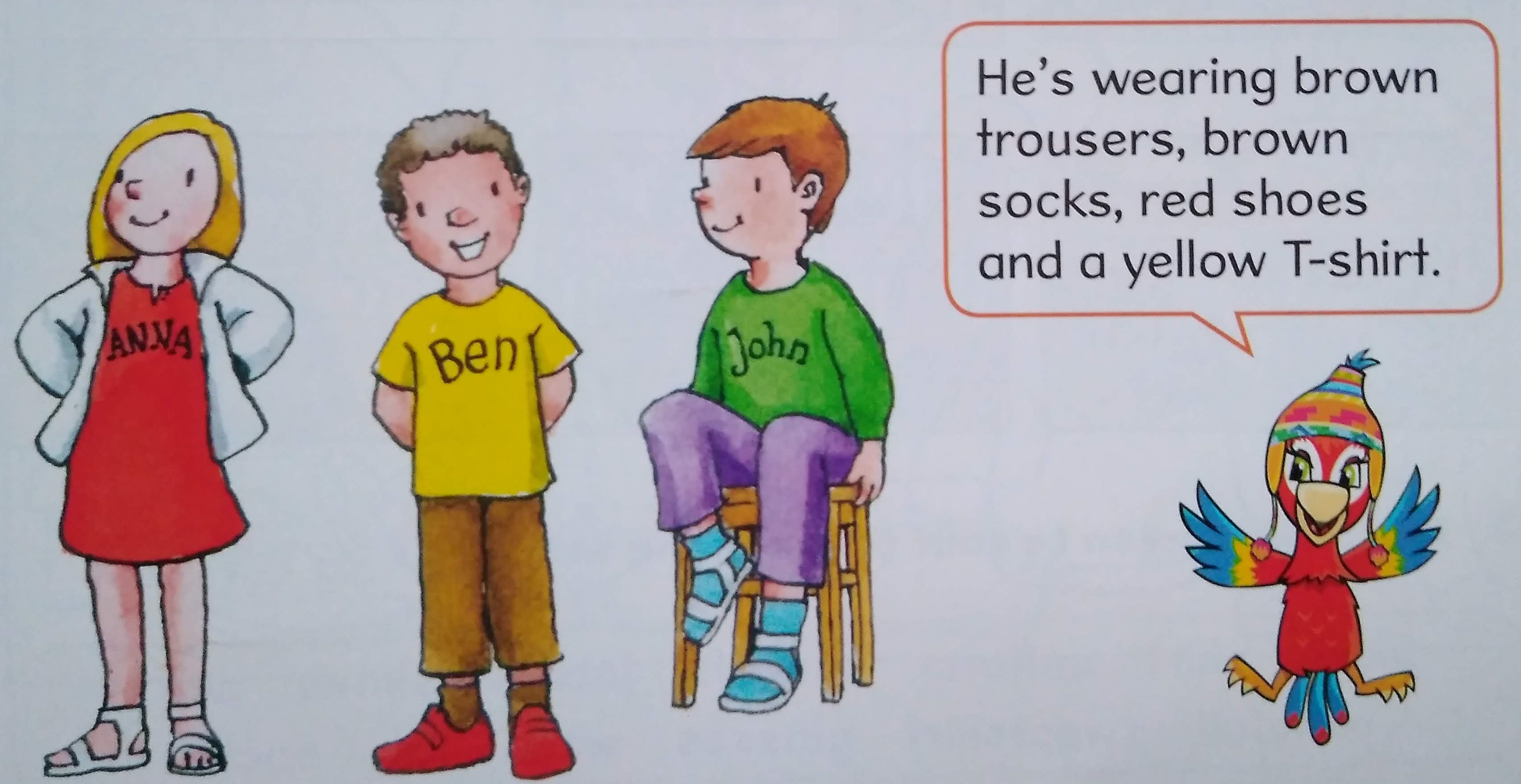 He's wearing brown trousers, brown socks, red shoes and a yellow T-shirt.